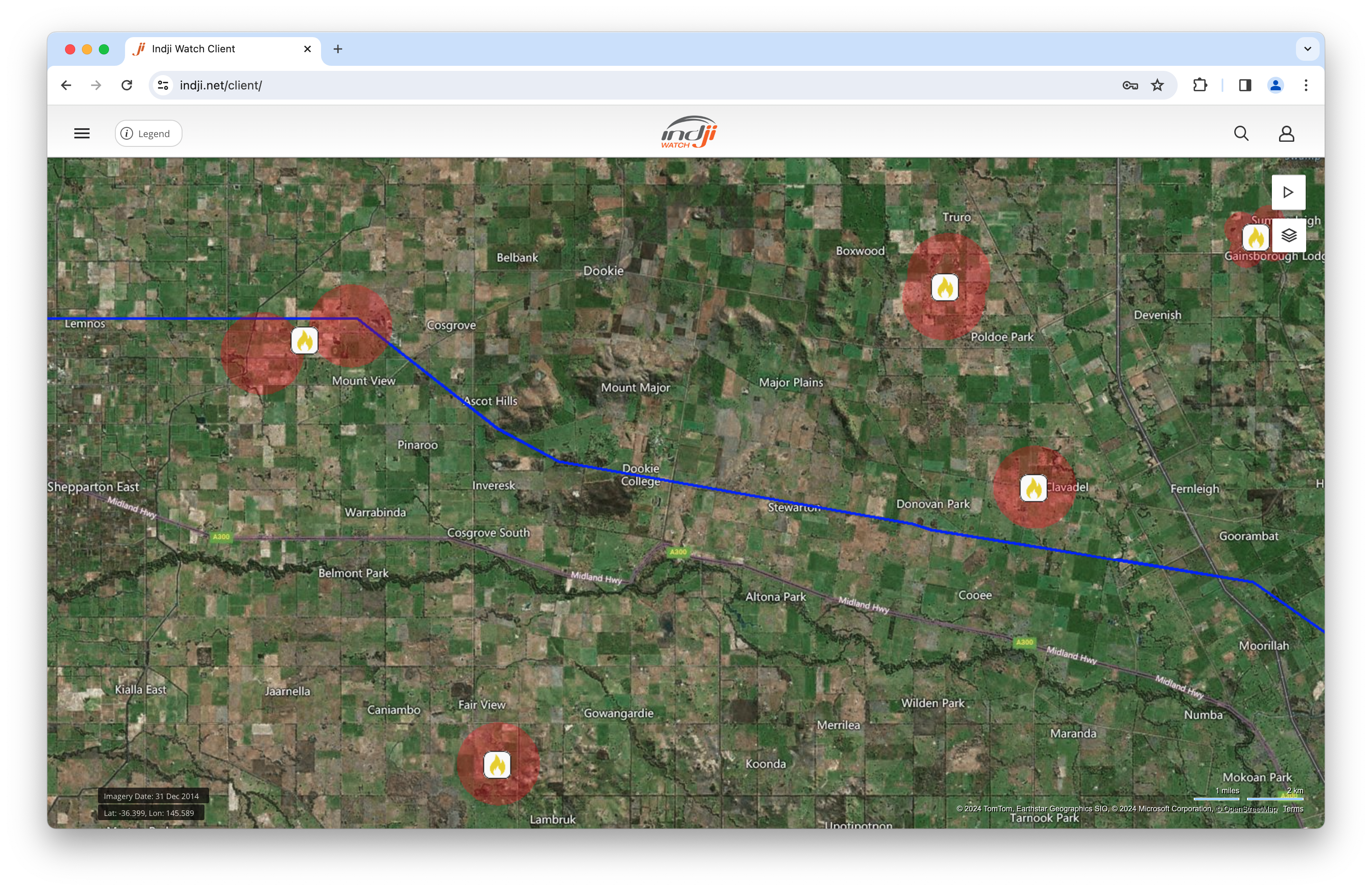 This screen capture of the Indji Watch user interface shows the location of a transmission line (blue line on map) along with the location of satellite-detected fires nearby. 