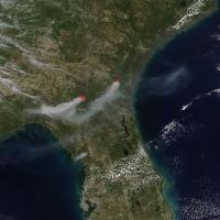 True-color corrected reflectance image of smoke emanating from wildfires in Georgia, USA on 21 April 2026 from the VIIRS instrument aboard the NOAA-21 satellite.
