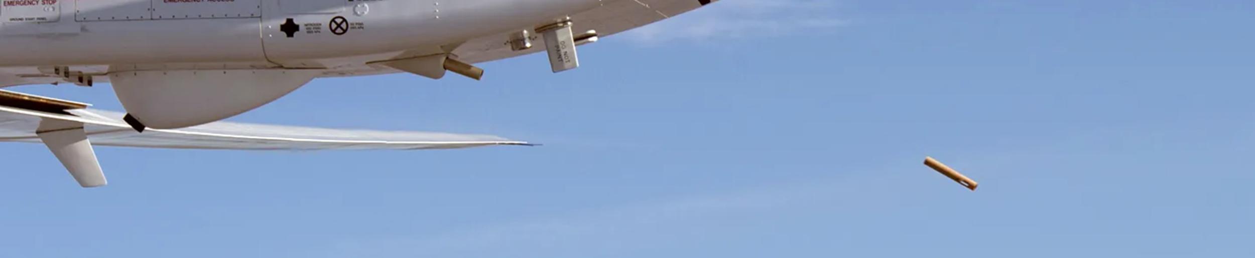 dropsonde being deployed from aircraft