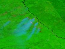 False-color corrected reflectance image of wildfires burning in the Krasnoyarsk region of Siberia from the VIIRS instrument aboard the NOAA-20 platform on June 17 2026.