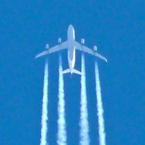 Contrails, or condensation trails, form when water vapor from airline exhaust condenses and freezes, forming clouds made of ice crystals.