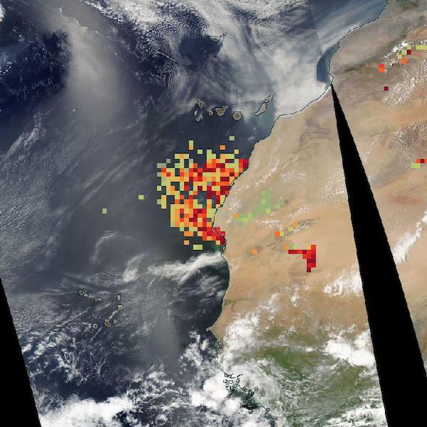 Satellite image of the west coast of Africa with colored dots ranging from green to crimson indicating high concentrations of dust.
