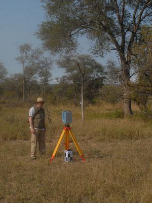 Photograph of a research laser scanning a savanna landscape