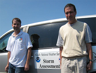 Kevin Gallo (R) with co-investigator Philip Schumacher (NOAA/National Weather Service, L) at a 2011 storm survey.