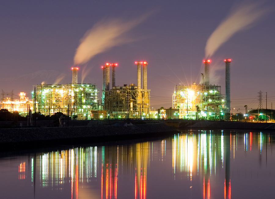 Photograph of a power plant at night