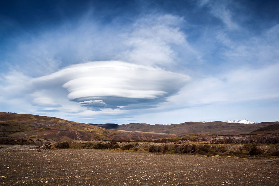 Photograph of large lenticular cloud over Torres del Paine National Park in Chile