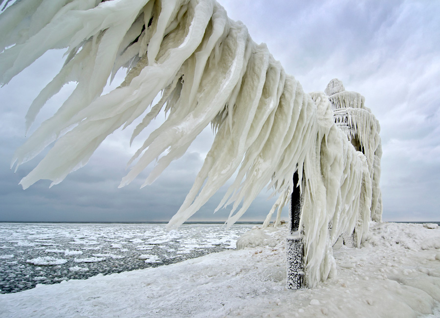 Photograph of an iced-over catwalk rail at a lighthouse