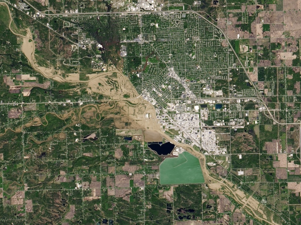 Two days of heavy rain, May 2020, led to catastrophic dam failures and major flooding in Midland County, Michigan. The natural-color image is from Landsat's Operational Land Imager.