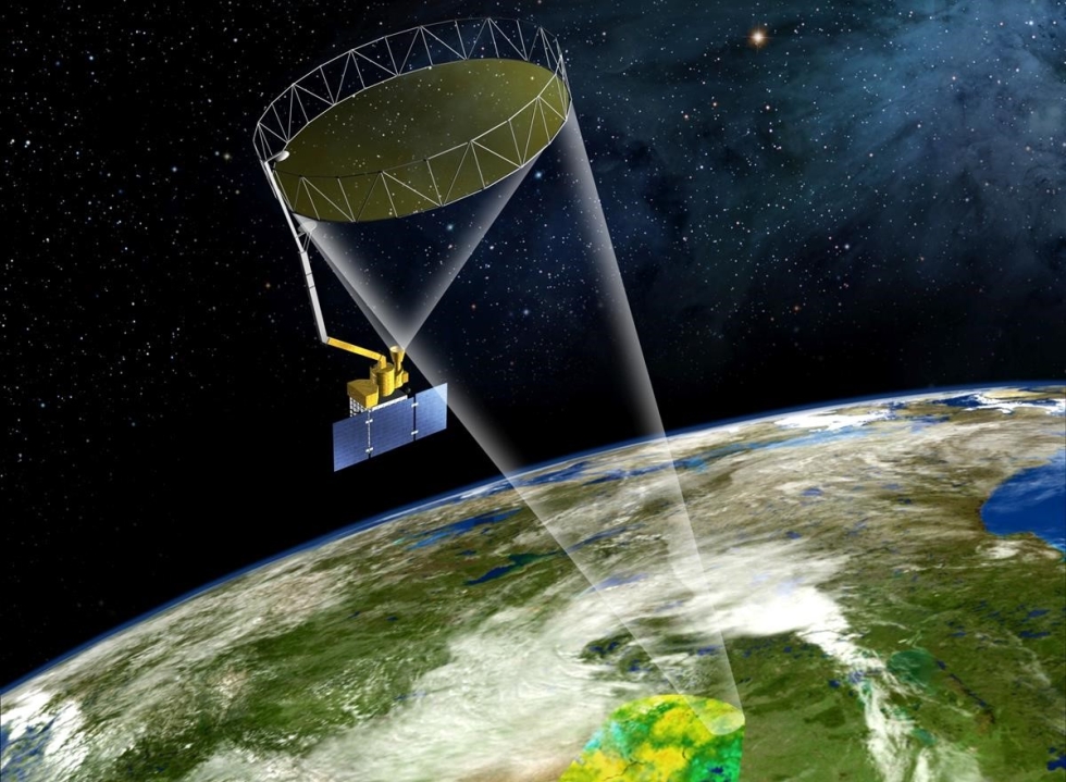 SMAP's rotating golden antenna functions like a satellite dish to focus radio waves from Earth's surface into a collector on the spacecraft. Image: NASA JPL/Caltech