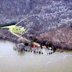 Periodic flooding in the Mississippi Valley can affect residents as far north as Minnesota and as far south as Louisiana. In May 2001, the Mississippi River flooded this house south of Red Wing, Minnesota.