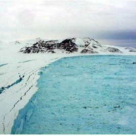 Photograph of cracks in the Larsen B Ice Shelf south of the Seal Nunataks on Mary 13, 2002