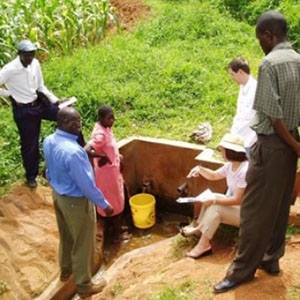 A protected spring provides a clean water supply to residents in Sauri, Kenya. (Image courtesy of Glenn Denning)