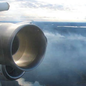 A view from an airplane window reveals some of the pollution that smothers the Arctic each spring and summer.