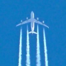 Contrails, or condensation trails, form when water vapor from airline exhaust condenses and freezes, forming clouds made of ice crystals.