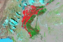 3-day composite showing flooding in red overlaid on a false-color image composite of flooding in Pakistan from the MODIS instruments aboard the Aqua and Terra satellites. 