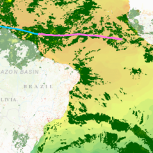 Image of Atlantic Ocean with orange/green colors indicating ocean temperature, pink line indicating storm track, and green colors indicating rain intensity.