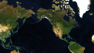 Satellite image of Earth with navy blue water and green biomass