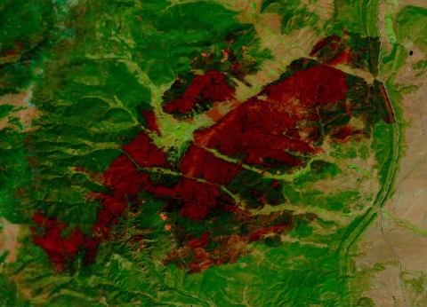 A screen shot of the HLS False Color Composite layer showing the burned area of the Hermits Creek in New Mexico on April 28, 2022.