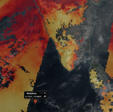 This January 3, 2023, image from NASA Worldview shows aerosols from fires in India drifting out over the northern Indian Ocean. The orange dots on the Indian subcontinent indicate the presence of fires while the yellow, orange, and red colors indicate aerosol concentrations over the ocean. Areas of yellow represent low concentrations while red areas indicate the highest. 