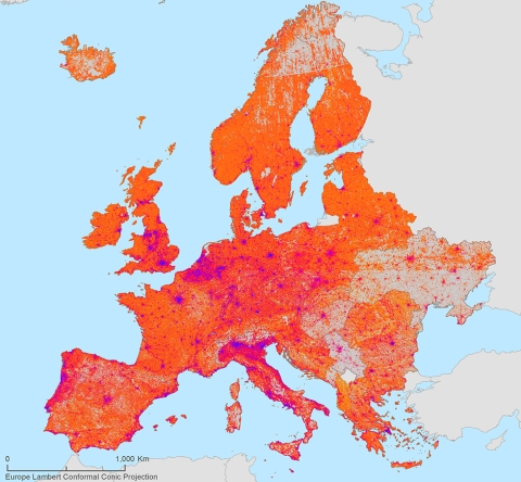 This map shows Europe colored in shades of blue, purple, orange, and red surrounded by light-blue ocean and non-European countries, such as Russia, in gray. Darker blue colors represent lower values of deprivation and brighter red colors indicate higher values. Most of the areas are colored orange and red with sporadic pockets of darker colors in countries such as England and Italy.