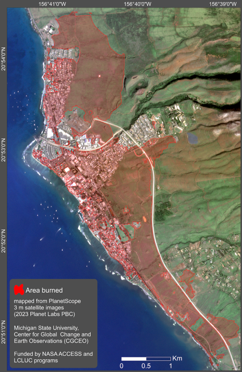 True color image showing land on right and blue water on left; red areas indicate burned areas with a city at the ocean edgs