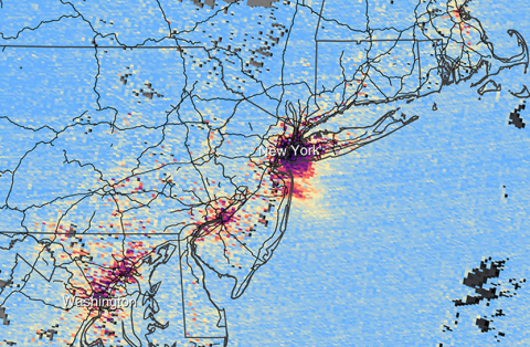 rectangular image showing the U.S. East Coast. Red/yellow areas extending from NY City to Washington, D.C., indicate areas of high NO2 concentrations.