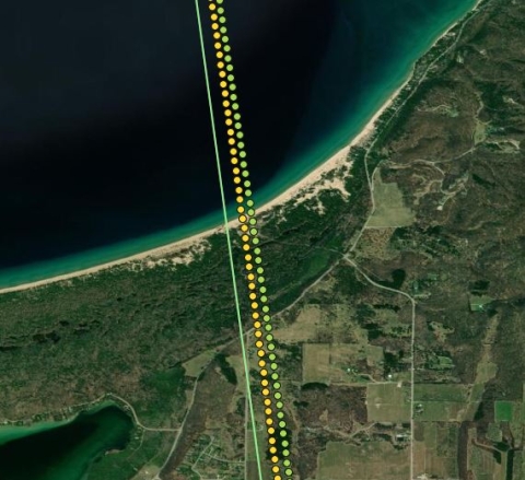 An image from OpenAltimetry showing the ICESat-2 orbit tracks and data-acquisition points along the northern end of Lake Michigan on March 11, 2023. 