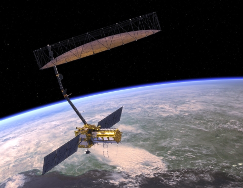 artist's rendering of the NISAR satellite in orbit over Earth