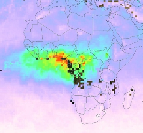 Image showing Africa with an overlay of colors indicating total carbon monoxide concentrations. Highest concentrations are in West-Central Africa and are indicated by red/yellow colors that fade to blue/green toward Eastern Africa and west over the Atlantic Ocean. Small black spots on image indicate absence of data.