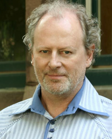 Headshot of Dr. Peter Fox taken outdoors.