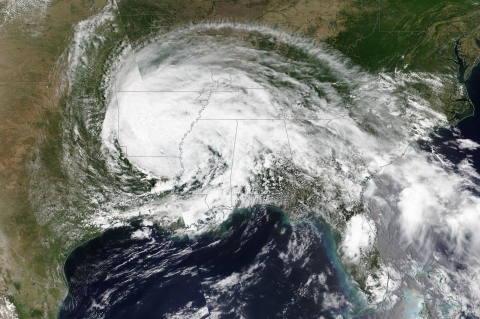 Tropical Depression Cristobal appears as a large, white, counterclockwise rotating storm over the Southern U.S.
