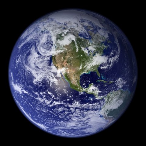 Full disk image of Earth in super high resolution with North America in the center created from multiple true color images of Earth.