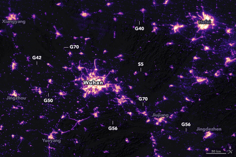 Satellite image shows nighttime lights near Wuhan, China on February 4. Highways appear darker than in January.