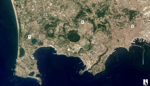 Satellite image acquired by the Advanced Land Imager instrument aboard NASA's Earth Observing-1 satellite showing the Campi Flegrei caldera cluster. Image shows Lake Avernus on the left; the Campi Flegrei caldera in the center; and the city of Naples, Italy on the right.