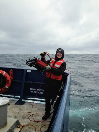 Allen recovers a radiometer during the North Atlantic Aerosols and Marine Ecosystems Study in November 2015. 