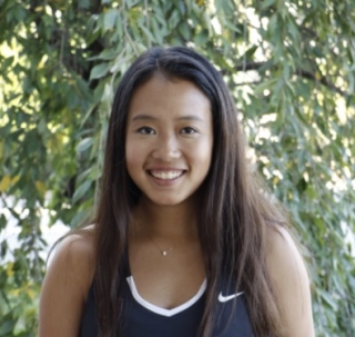 Headshot of GES DISC summer intern Lauryn Wu standing outside with a tree behind her.